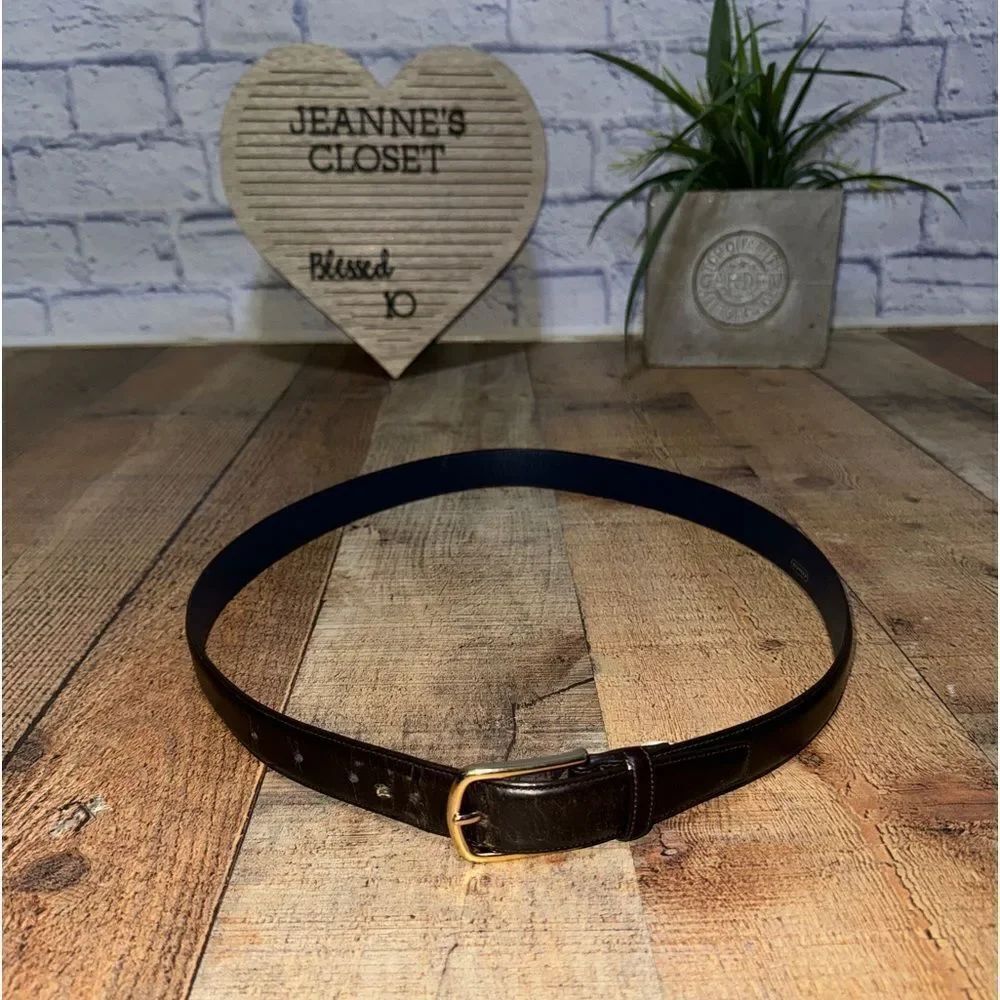 Black leather coach belt *has flaw